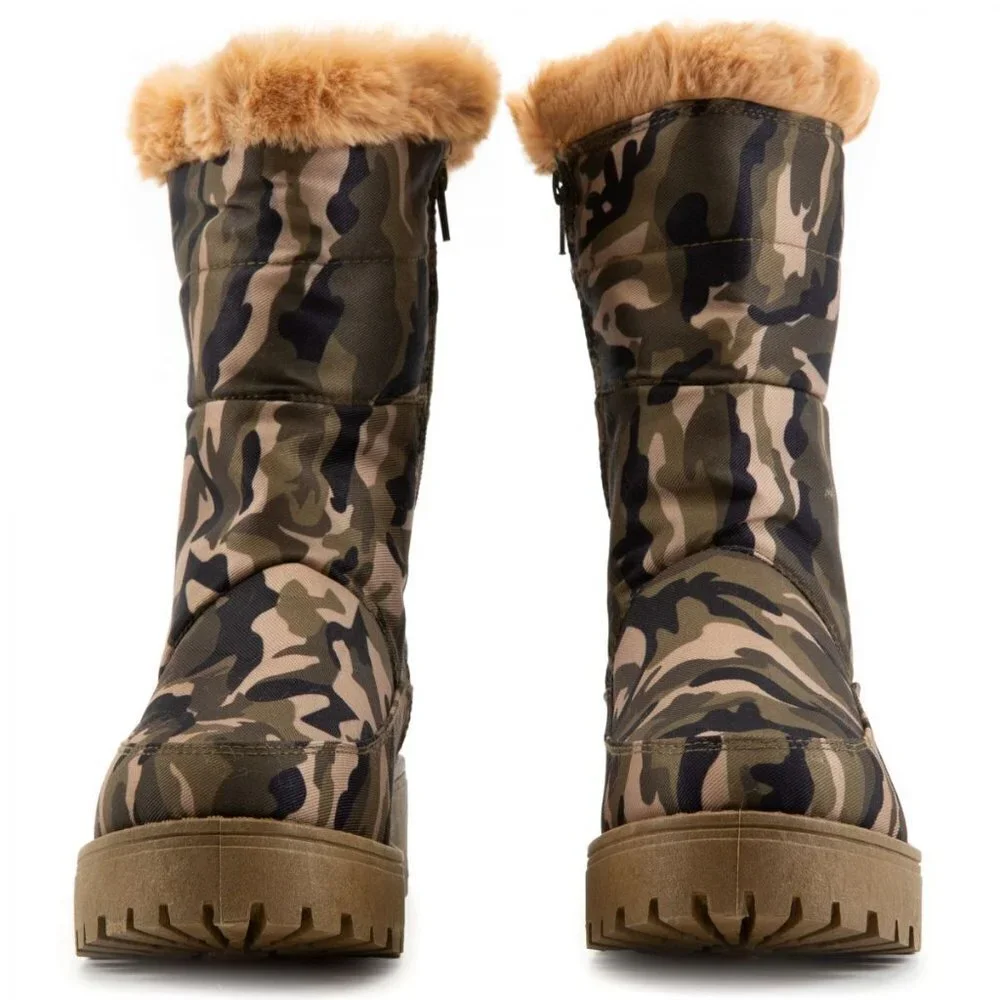 The Wild  Puffer Mid Boots